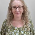 Ruth smiling with glasses